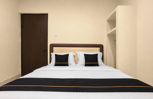 Palembang Hotel | Hotel O near Social Market formerly Kost