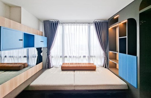 Panunggangan Utara Apartment | Cozy Studio With Murphy Bed At Collins Boulevard Apartment