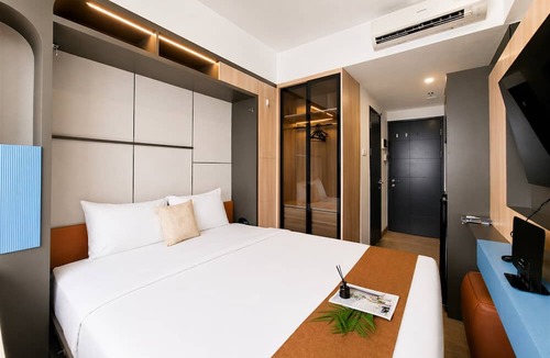 Panunggangan Utara Apartment | Cozy Studio With Murphy Bed At Collins Boulevard Apartment