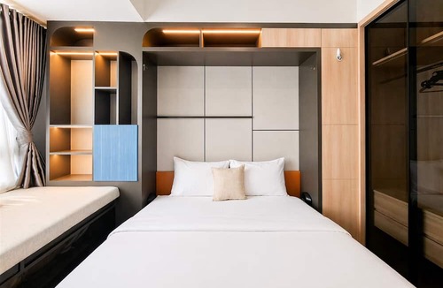 Panunggangan Utara Apartment | Cozy Studio With Murphy Bed At Collins Boulevard Apartment