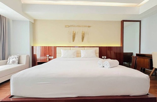 Ngaglik Apartment | Classic Wooden Touch Studio Room At Apartment Mataram City
