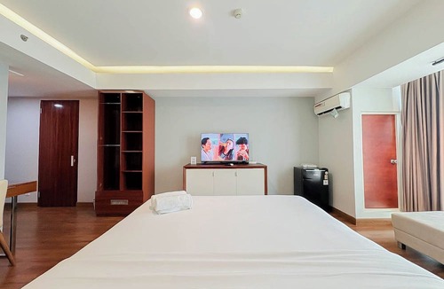 Ngaglik Apartment | Classic Wooden Touch Studio Room At Apartment Mataram City