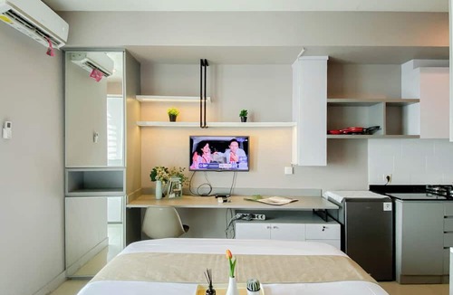 Pekayon Jaya Apartment | Restful Stay In Studio Room At Apartment Grand Kamala Lagoon