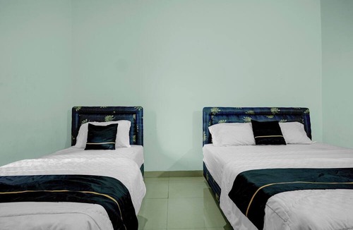 Palembang Hotel | Hotel O near Palembang Square Mall formerly Wisma Faeyza Syakira