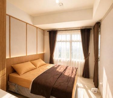 Wonokromo Apartment | Apartment with Living Room and Pool View