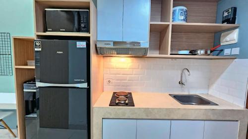 Pinang Apartment | Springwood At By Liviarooms Tangerang