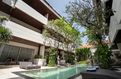 Sunset Road Apartment | Swiss-Belcourt Sunset