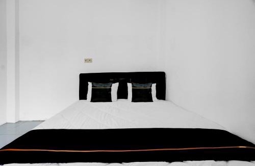 Beji Hotel | Hotel O near Jatim Park 3 formerly Srikandi Residence
