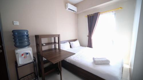 Sidoarjo Apartment | Best Price and Homey 1BR at Tamansari Prospero Sidoarjo Apartment By Travelio