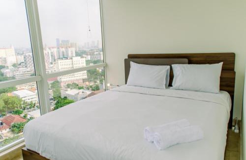 Cikini Apartment | Elegant and Restful 2BR at Menteng Park Apartment By Travelio