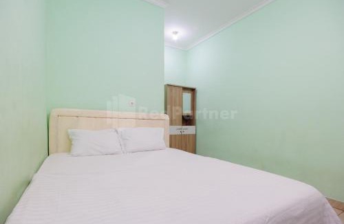 Depok Hotel | Fajar Inn Mitra RedDoorz