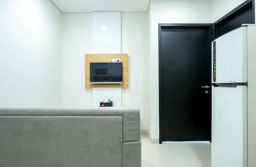 Pondokcina Apartment | Homey and Modern 2BR Apartment at Atlanta Residence By Travelio