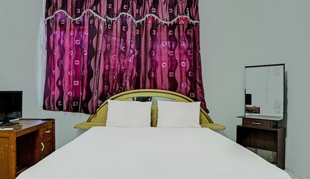 Hotel O Kost Axcel in Banjarmasin