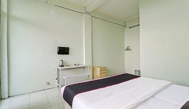 Capital O 91466 Hotel Neu Backpacker Tf Syariah (smk Tb)
