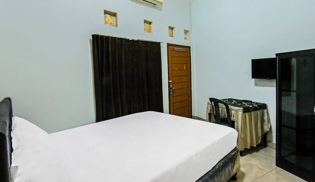 OYO 92095 Wisma Dhana Syariah in Kecamatan Janapria