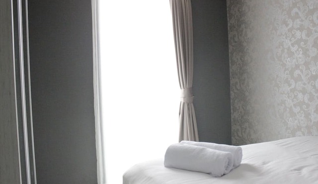 Pleasant and Homey 2BR Apartment at Tamansari La Grande