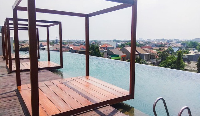 Comfy and Simply Studio Room at Grand Kamala Lagoon Apartment