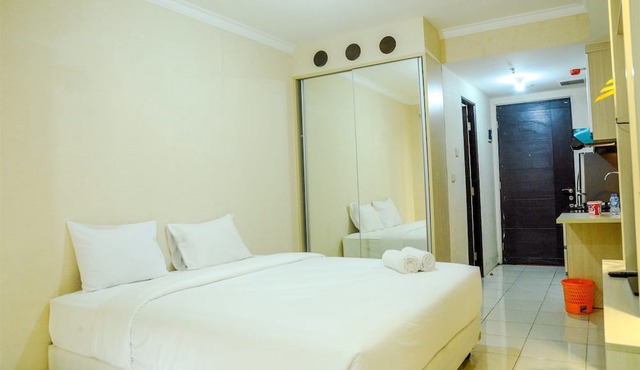 Modern Studio Grand Serpong Apartment By Travelio in Tangerang