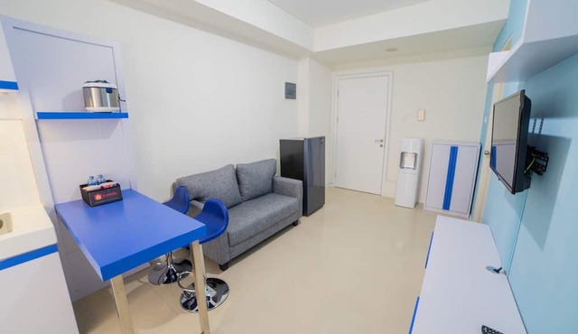 Cozy Apartment at Parahyangan Residence with Direct Access to Swimming Pool