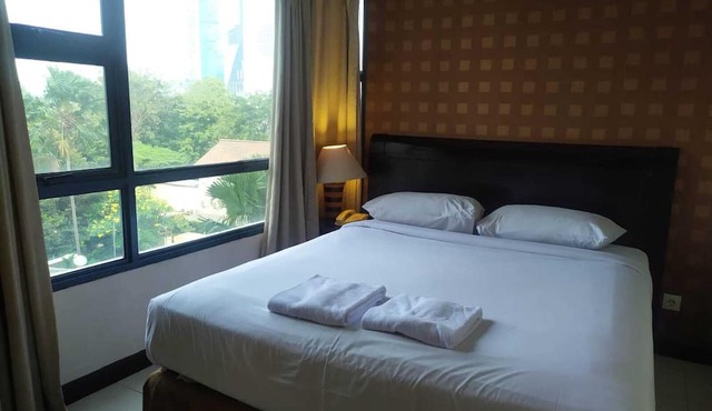 Grand Tropic Suites Hotel