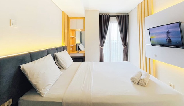 Neat Warm Wooden Tone 1Br At Patraland Amarta Apartment in Ngaglik