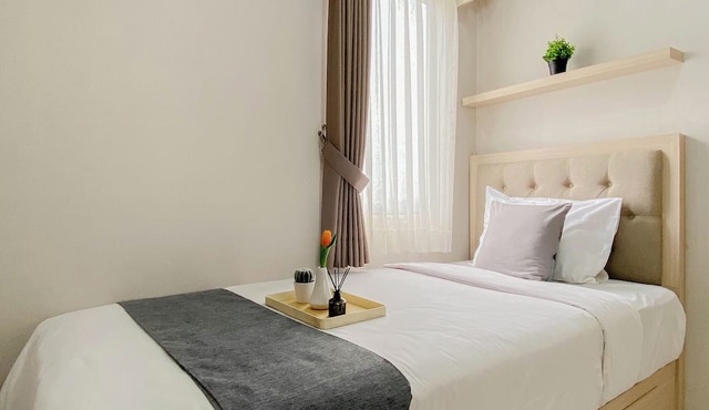 2BR Corner with South and East View at Podomoro Golf View Apartment