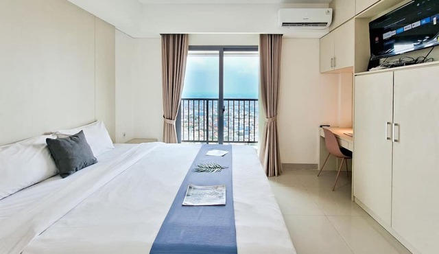 Wooden Accents 1Br Without Living Room At Bintaro Embarcadero Apartment