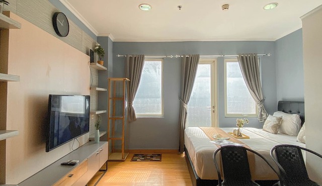 Warm and Cozy Studio at Sentul Tower Apartment