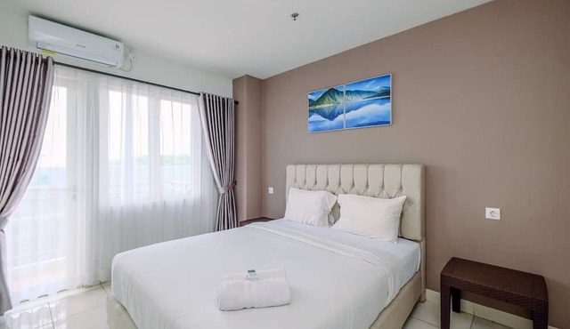 Comfort and Homey 2BR at Sentul Tower Apartment