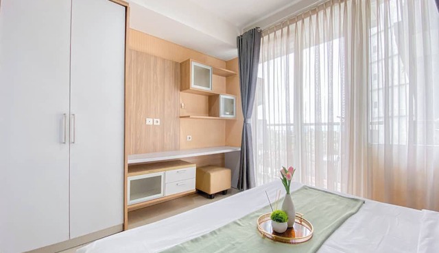 Homey and Comfortable 1BR Apartment at Dago Suites