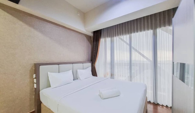 Cozy And Warm Studio Room At Uttara The Icon Apartment in Depok