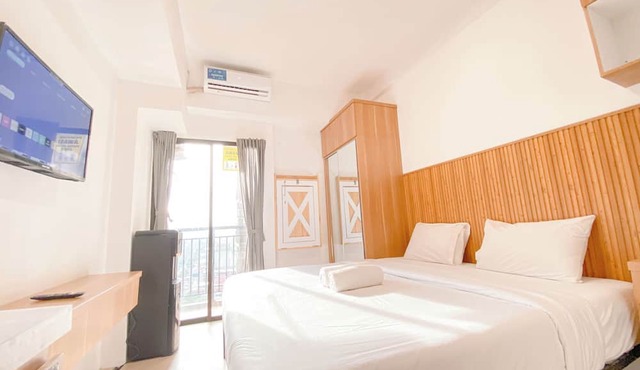 Homey & Restful Studio At Tamansari Panoramic Apartment