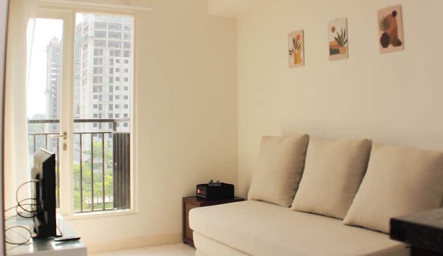 Nice and Comfort 1BR with Extra Room at Podomoro Golf View Apartment