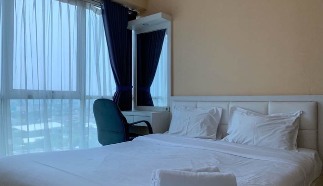 Warm And Cozy 2Br At Tifolia Apartment