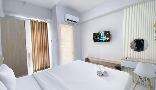 Minimalistic and Cozy Studio Amartha View Apartment
