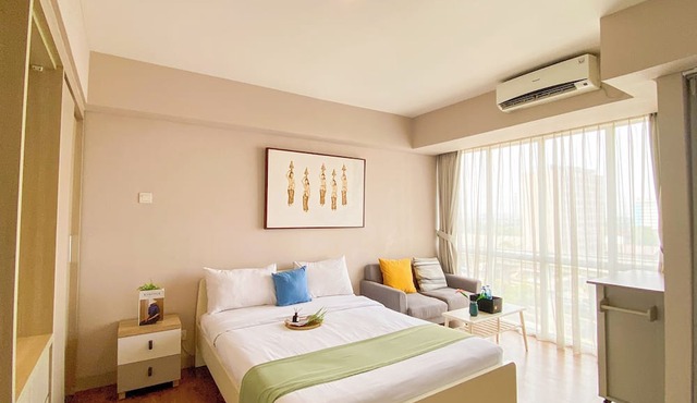 Homey and Good Studio at H Residence Apartment