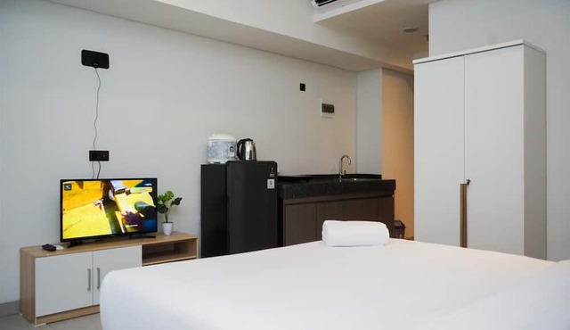 Studio Apartment With Sofa At Carstensz Residence
