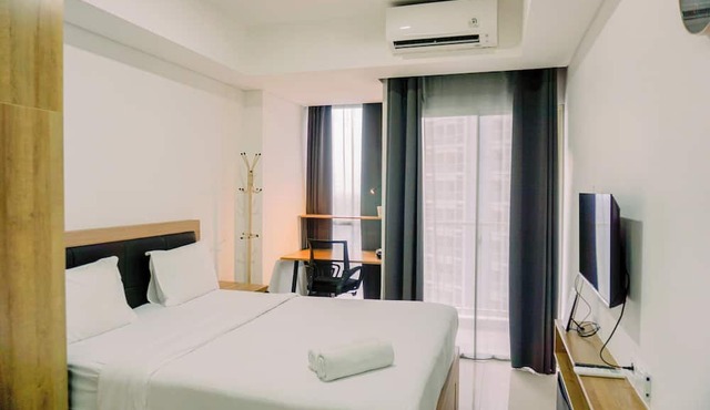 Nice And Modern Studio At 38Th Floor Pacific Garden Apartment in Tangerang
