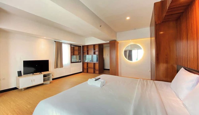 Modern Studio Room Apartment At Tamansari La Grande