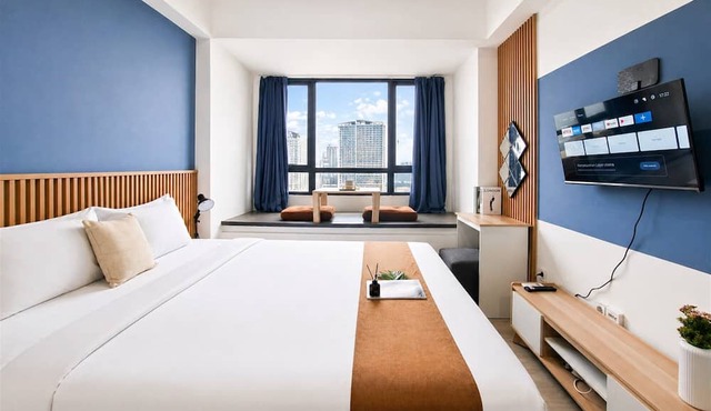 Chic Blue Tinted Studio Room At Apartment Collins Boulevard