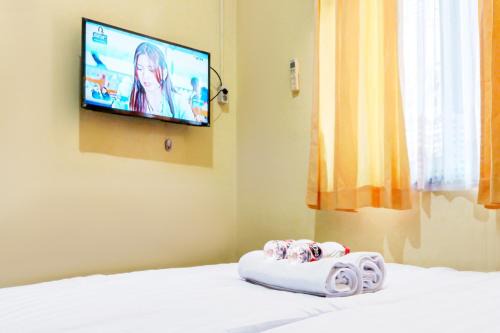 Homestay Nangkaan Estate Mitra RedDoorz