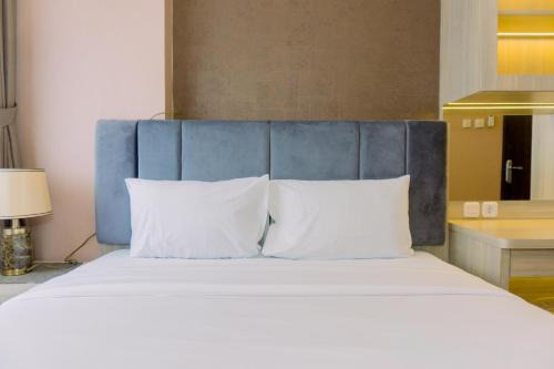 Comfort and Comfy 2BR at Great Western Resort Apartment By Travelio