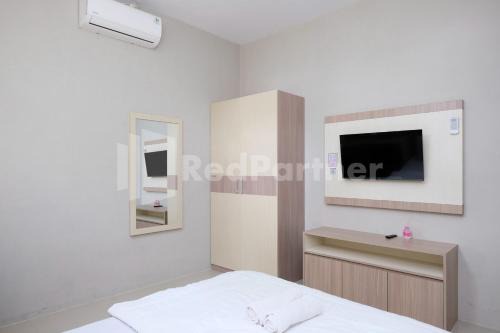 Kinara Homestay RedPartner Near Sleman City Hall